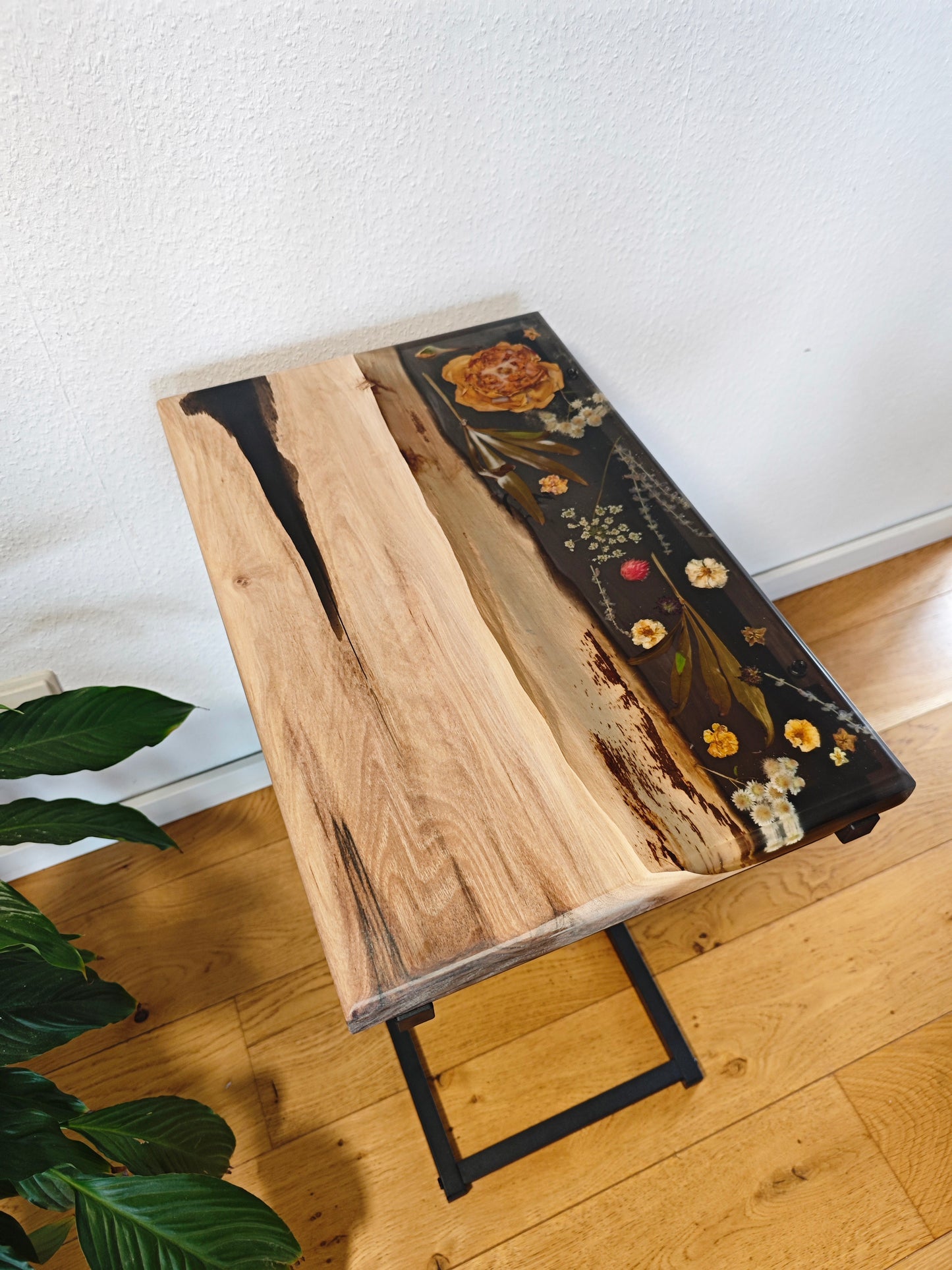 Side table made of walnut wood and black epoxy resin