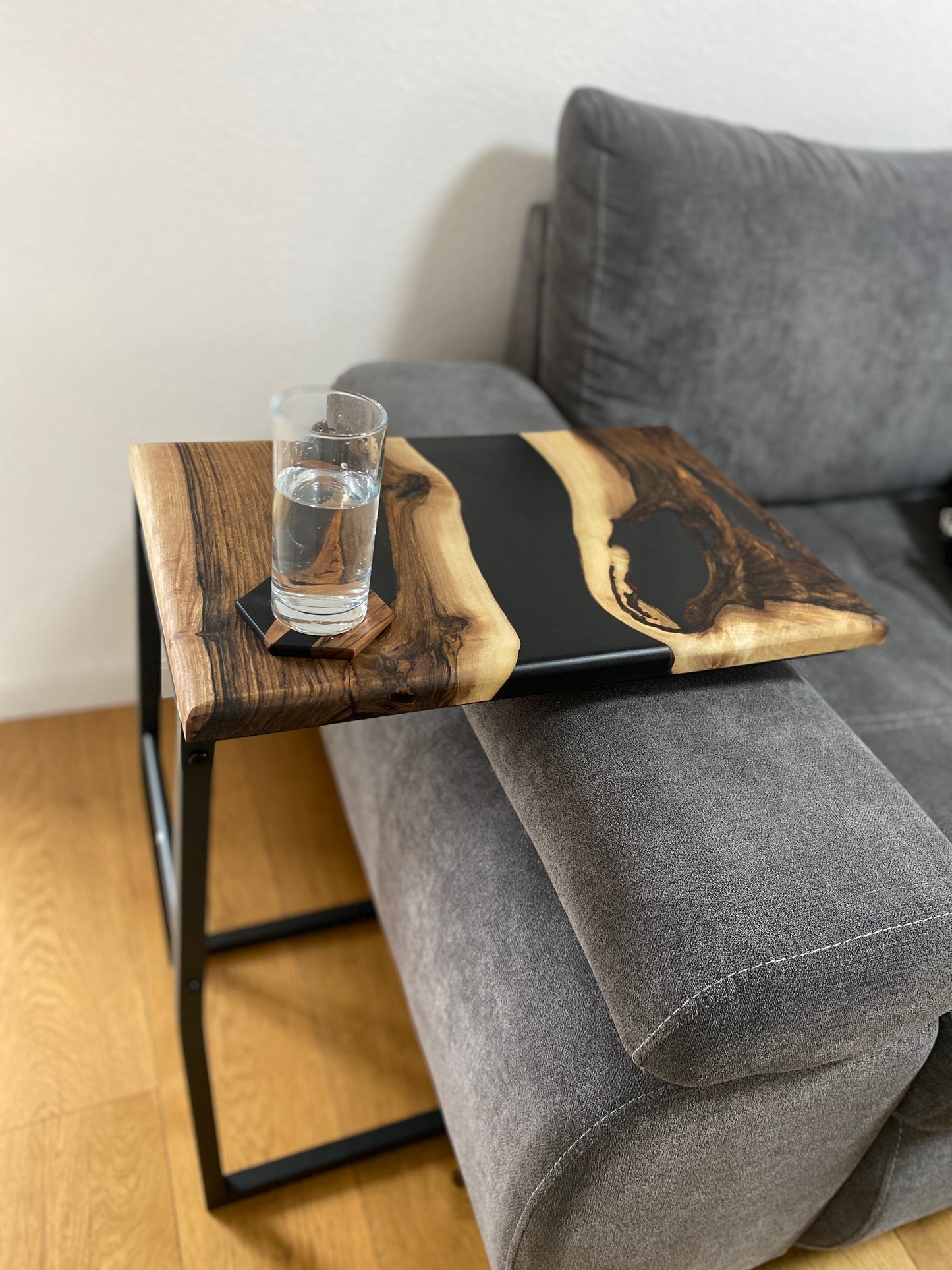 Side table made of walnut wood and black epoxy resin